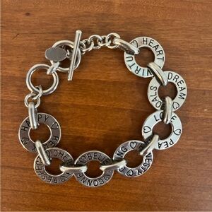 Cookie Lee Silver Bracelet 8in and can be adjusted down to 7 and 7.5